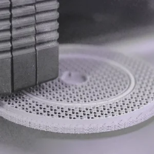 Bound Metal Deposition prints metal parts using metal rods infused with polymer binders, similar to FDM. After printing, the parts undergo debinding and sintering to achieve full metal strength